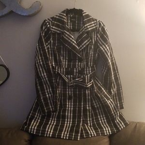 Belted black and white plaid rain trench